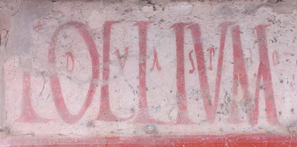 Shopfront lettering at Pompeii. (Photo by the author.)