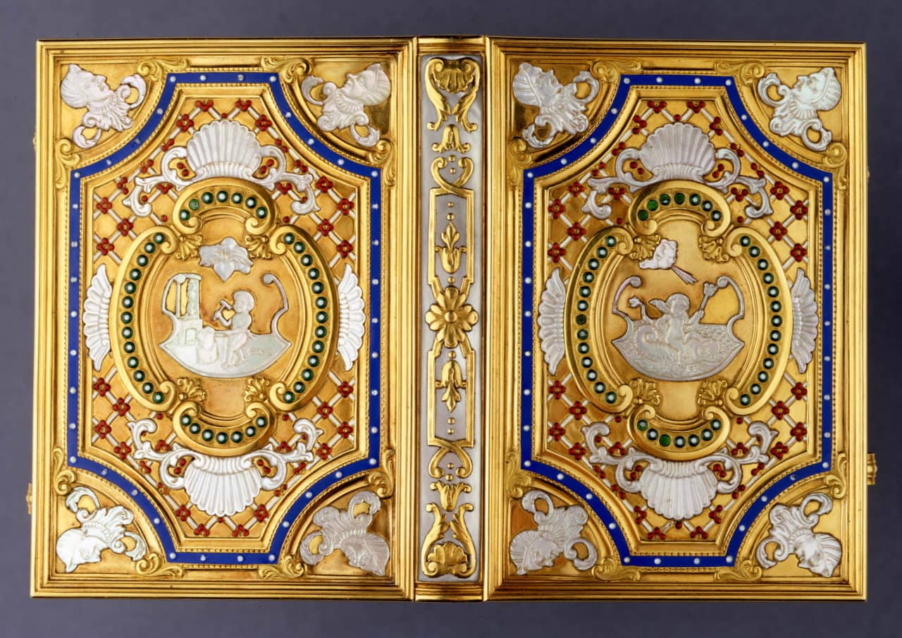 Late 19th century ivory notebook, with three ivory leaves between covers decorated in gold
