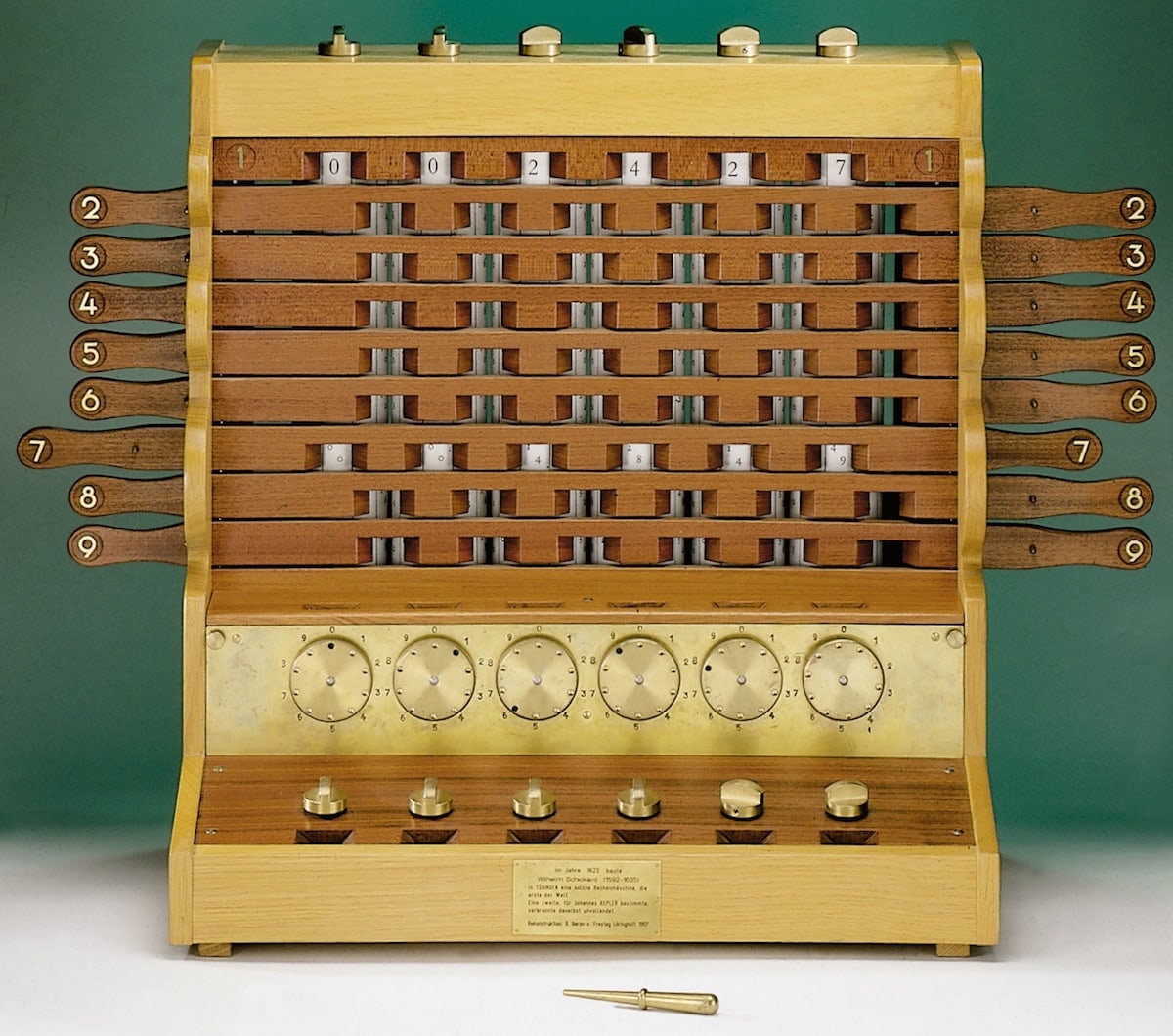 A modern reproduction of Wilhelm Schickard's <i>Rechenuhr</i>, or "calculating clock". At top is a set of Napier's bones to help with large multiplications, while the dials at the bottom drove an adding mechanism.